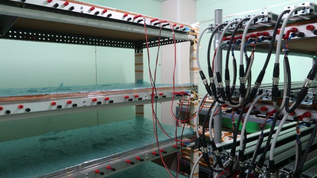 エージング作業工程において専用治具製作を行い、工数削減